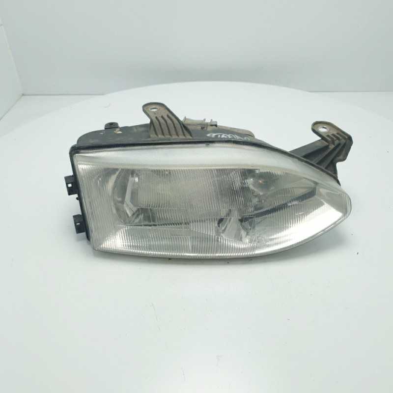 Faro fanale proiettore Fiat Strada 1997-00 anteriore destro H4 ATTENZIONARE FOTO Faro fanale proiettore Fiat Strada 1997-00 anteriore destro H4 ATTENZIONARE FOTO