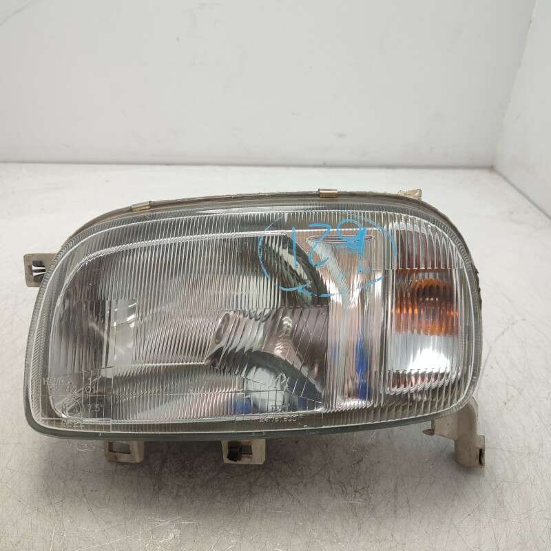 24751500 Faro fanale proiettore gruppo ottico frontale SX Nissan Micra 1992-98 1 gancio rotto
