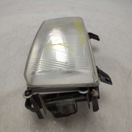 Faro fanale proiettore gruppo ottico frontale VW Transporter IV 1990 sinistro