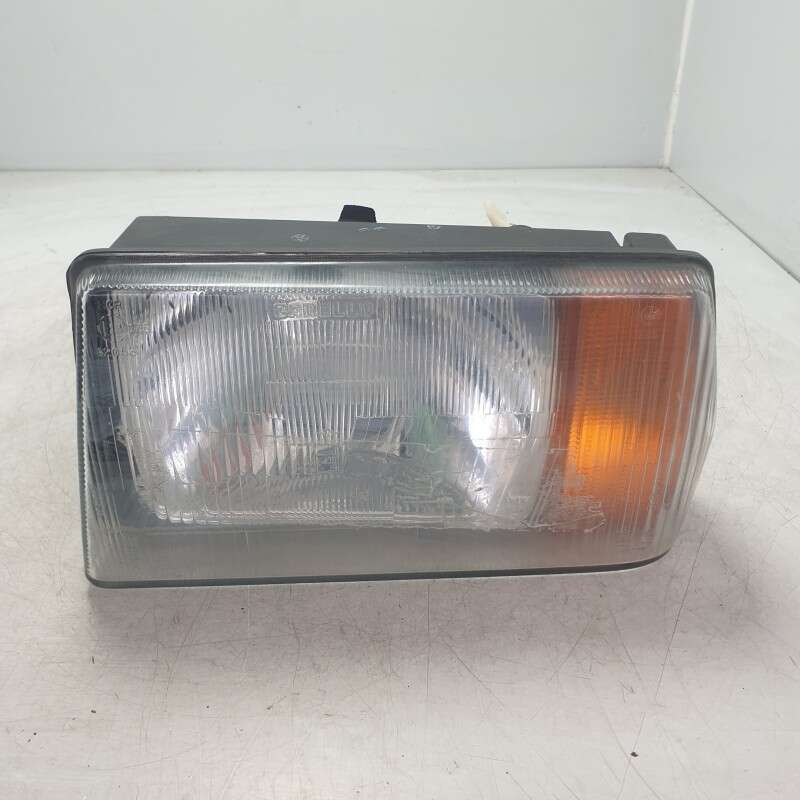 Faro fanale proiettore Lancia Delta 1° serie 1979-86 anteriore sinistro Carello