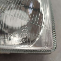 607 Carello faro fanale proiettore Innocenti Mini Mille 1982-91 anteriore sinistro H4