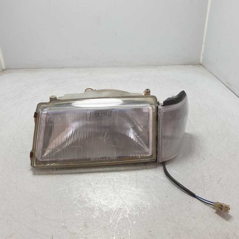 7642686 Faro fanale proiettore frontale sx con freccia Fiat Uno 1983-95